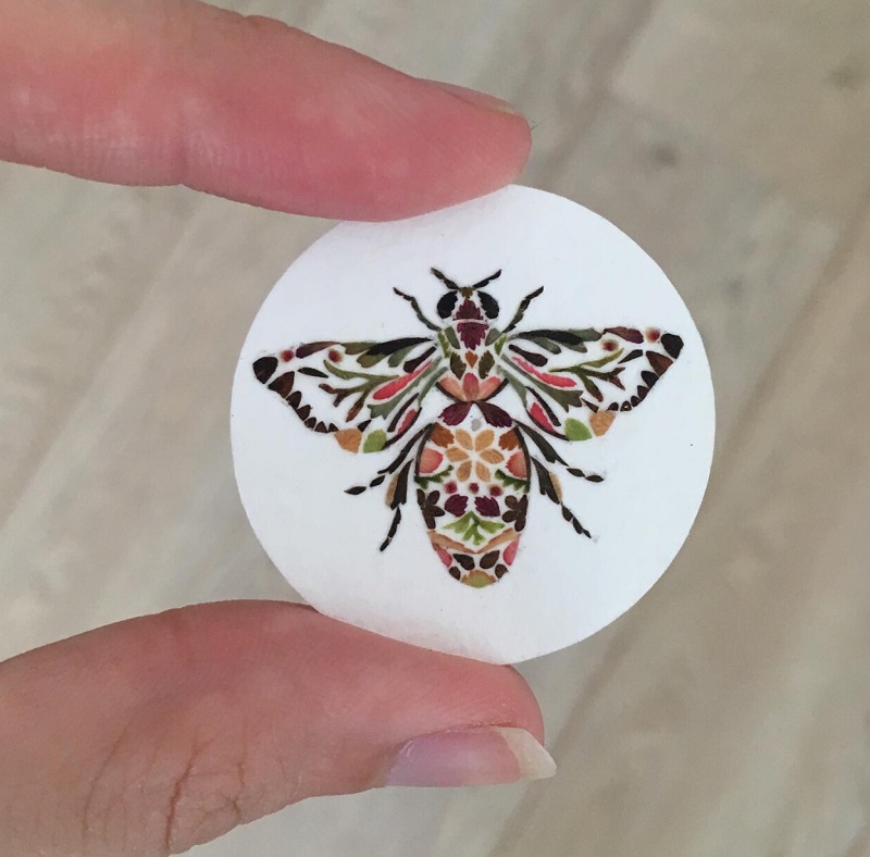 A fly made of flowers by Helen Ahpoornesiri; Photo source: Helenahpornsiri.com website