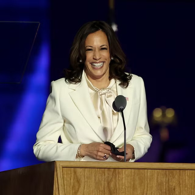 Kamala Harris in a white dress by Carolina Herrera
