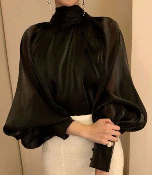 Black satin cloth worn in Muharram