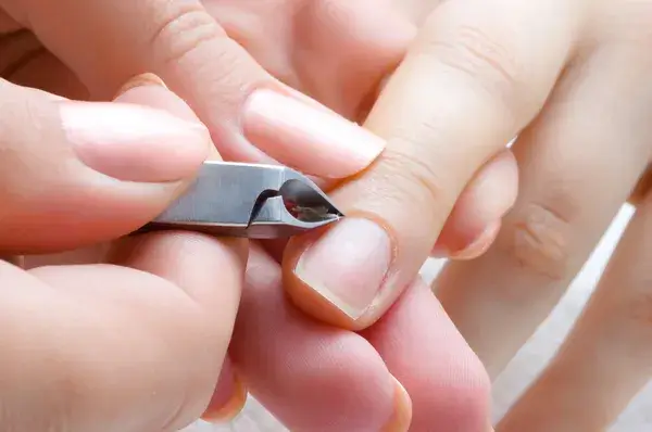 Nail cuticle removal for hand manicure