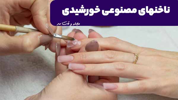 Nail implaation with long peach artificial nails 