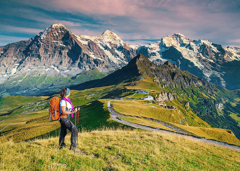 Climbing in the mouains of Switzerland. Photo from wanderluststorytellers website