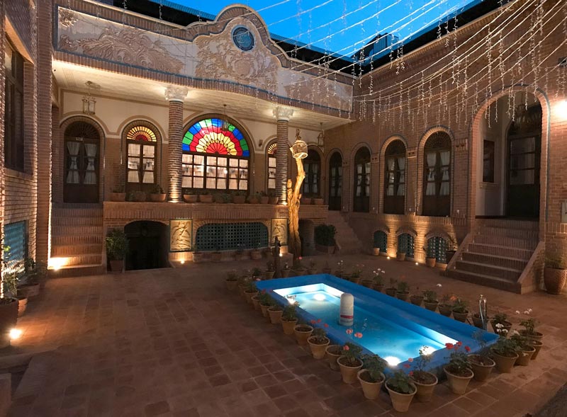The ceral courtyard of Tehran's Razaz Boutique Hotel at night; Photo source: Google Map; Photographer: Tripadvisor
