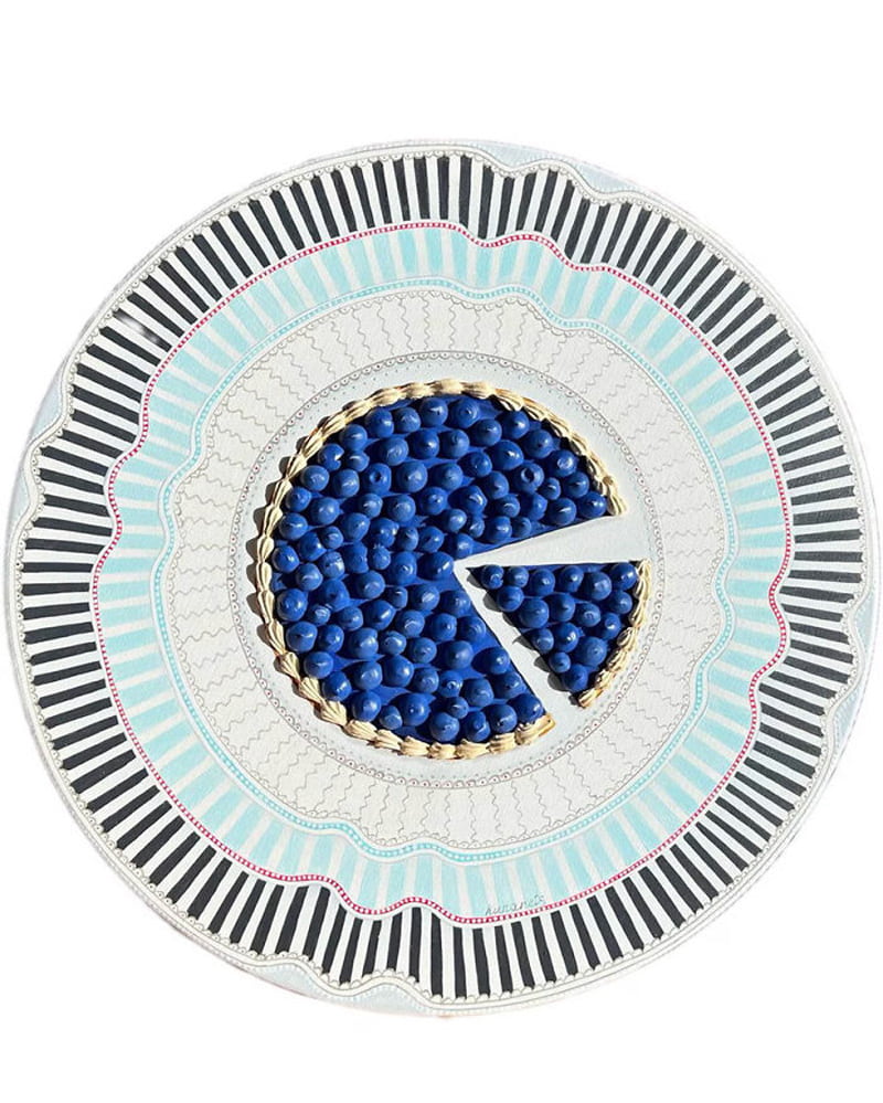 A picture of a blueberry tart on a plate