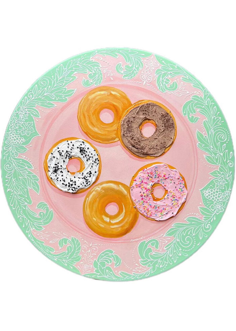 Paiing donuts on a plate