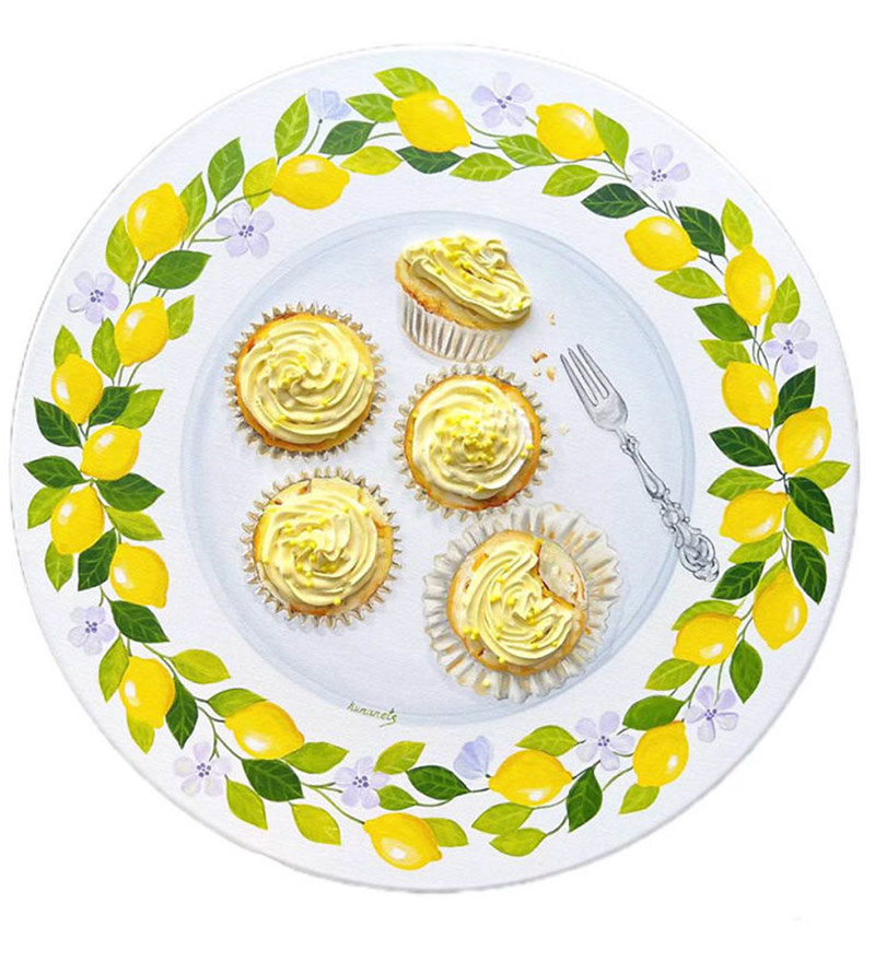 Paiing lemon cupcakes on a plate