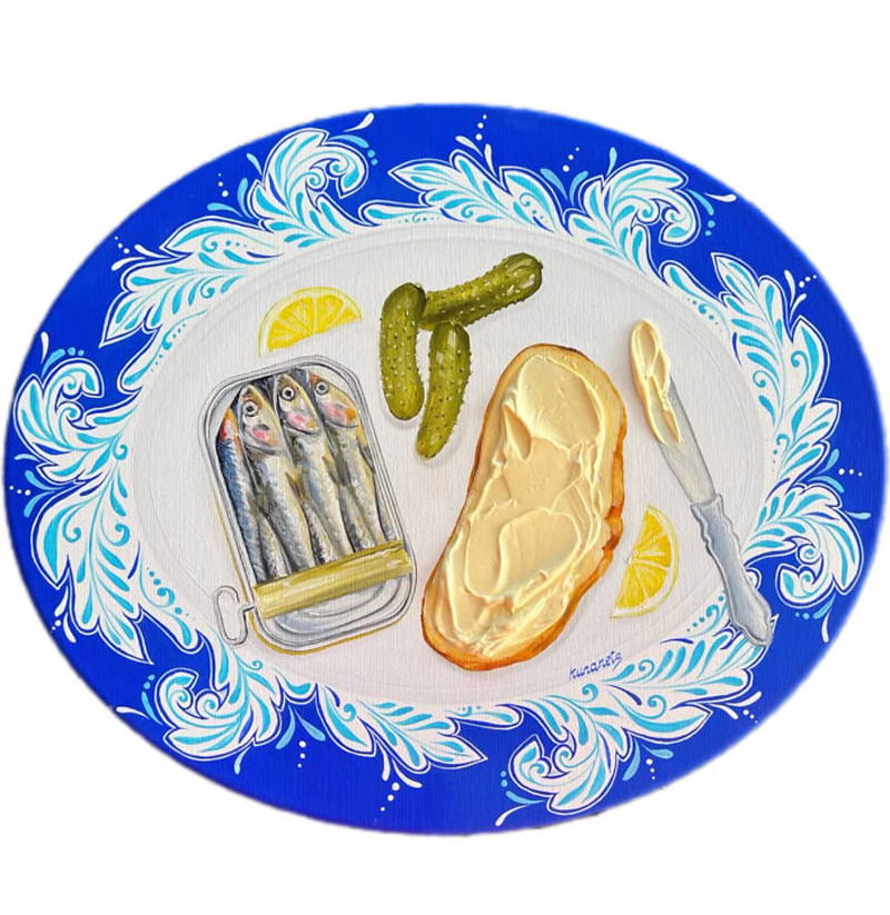 Paied plate of bread and fish