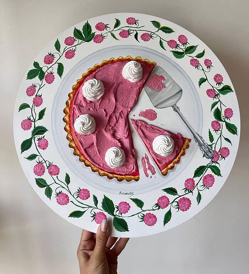 Paied strawberry cake on a plate