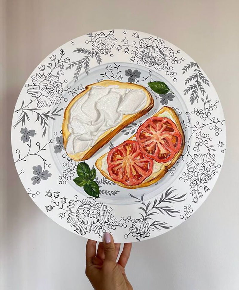 Bread, cheese and tomato paied on the plate