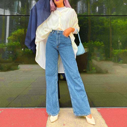 A set of bag jeans with white paper and casual shoes