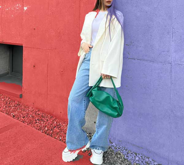 A set of blue baggy pas with a short white coat