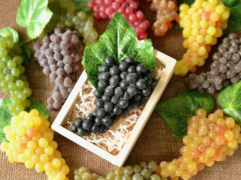 Soap in the form of bunches of differe grapes
