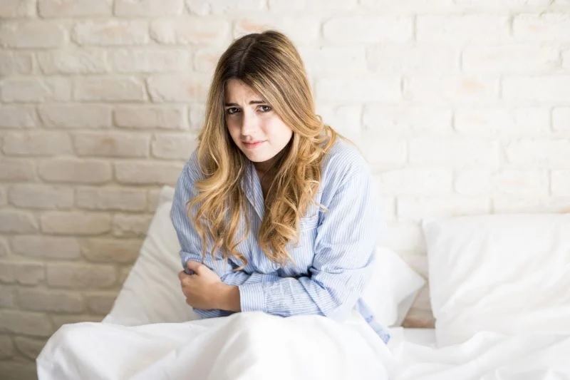 Is pain in the lower abdomen after iercourse a sign of infection or pregnancy?