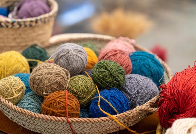 ball of colorful yarns for carpet weaving; Photo source: zeeen; Name of the photographer: unknown