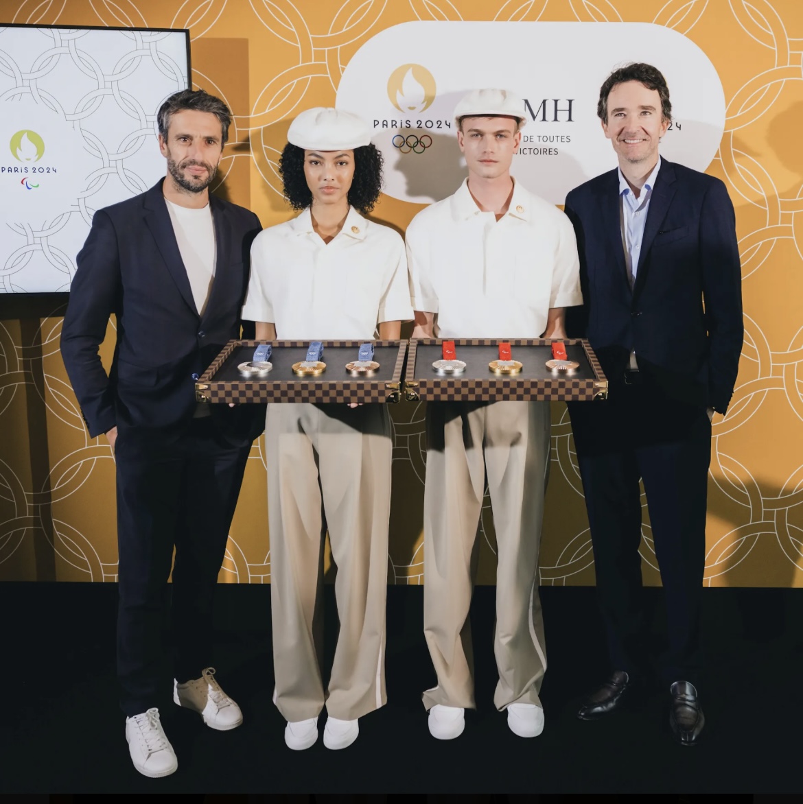 The clothes of the Olympic ages are designed by Louis Vuitton.