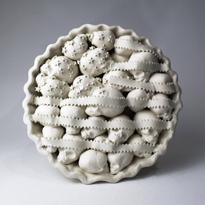 Tart porcelain skull sculpture