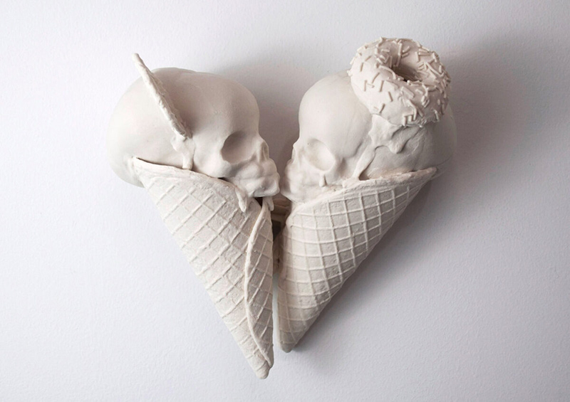 Two Chinese ice cream cones decorated with skulls
