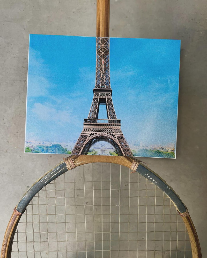 Combined photo of rocket and Eiffel Tower