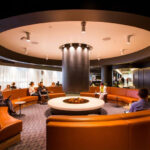 Qantas passengers in the business lounge of the airport; Photo Source: Qantas, Photographer: Unknown