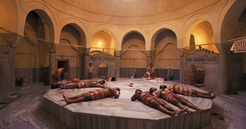 Men in the hot part of the Turkish bath in Istanbul