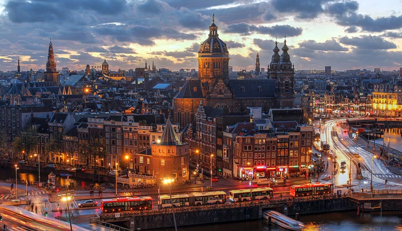  Old buildings of Amsterdam, Holland; Photo source: holland.com, photographer: unknown