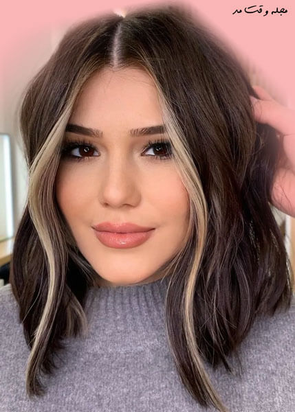 Long brown hair with a dark blonde face frame