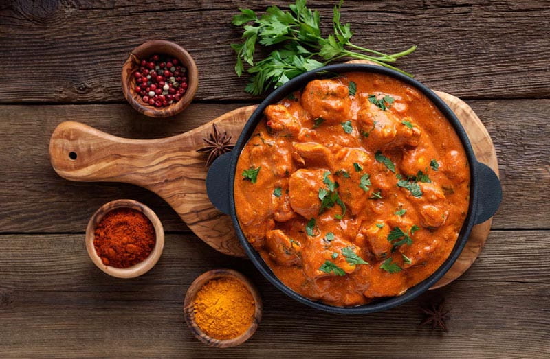 Indian butter chicken; Photo source: rainforestcruises; Name of the photographer: unknown