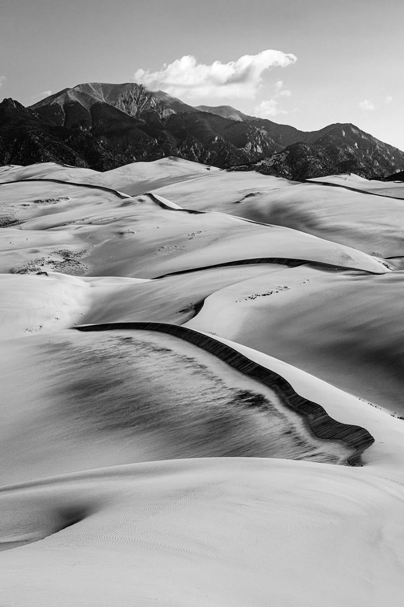 Black and white photo of snow in the mouains