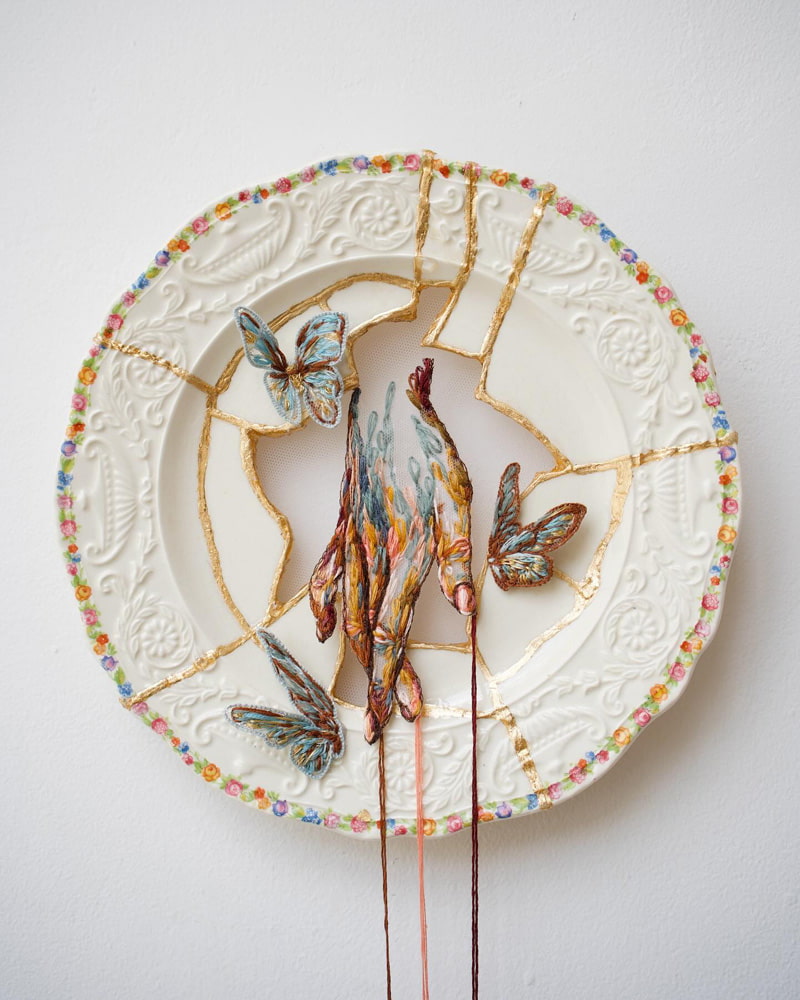 Hand drawing on gold and white plate