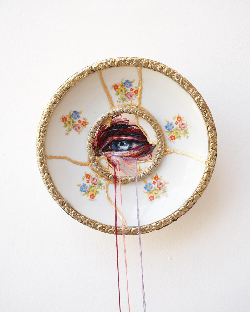 Eye design on a white porcelain plate