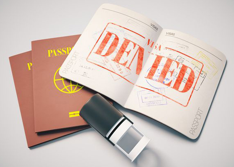 visa rejection stamp on passport pages; Photo Source: Avukat Kubra Keles, Photographer: Unknown