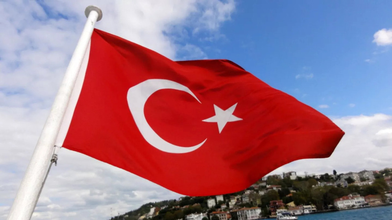Turkish flag with island background; Photo source: Euronews.com, photographer: unknown