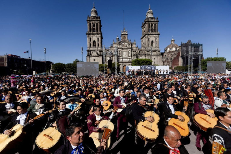 hundreds of mariachi musicians performing traditional Mexican songs in Plaza de la Constitució; Photographer: Quetzalli Nixcte-Ha 