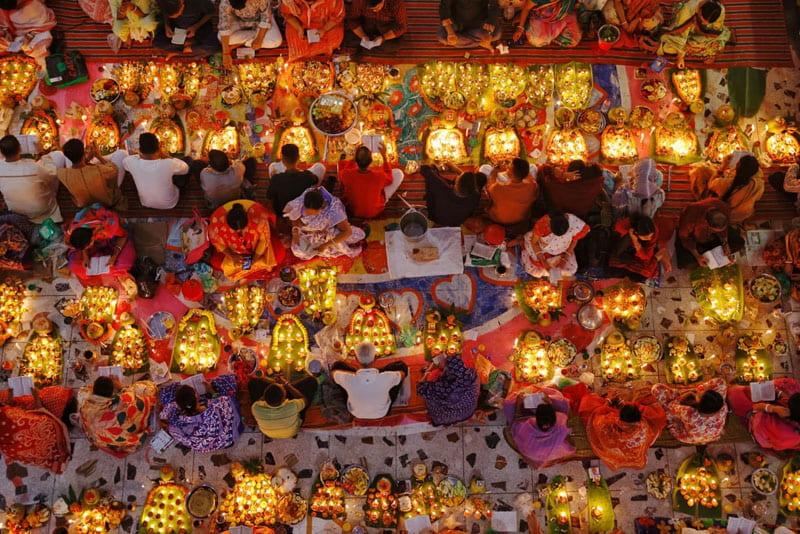 Holding the annual Rakher Upobash festival in a temple in Dhaka; Photographer: Mohammad Ponir Hossain