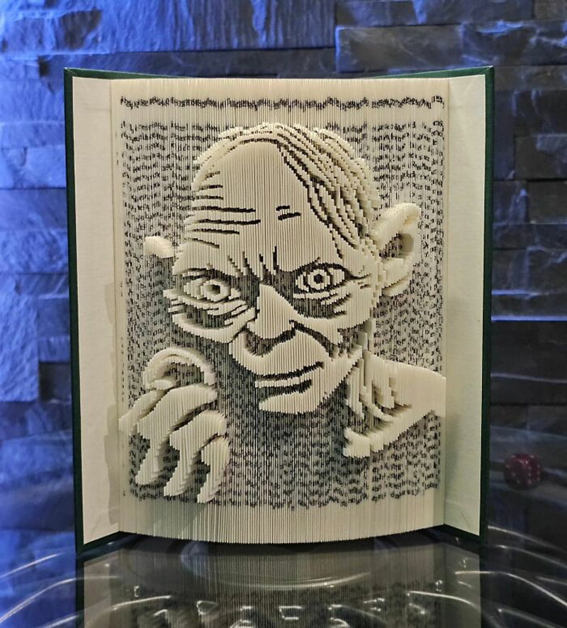 Book statue of Gollum character in Lord of the Rings