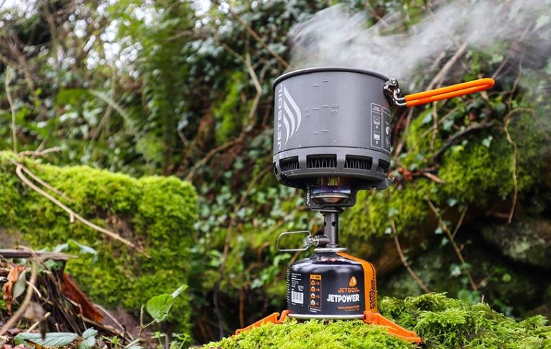 Cooking with a Snowhawk travel torch in the wild; Photo source: Snowhawk website. Photographer: Unknown