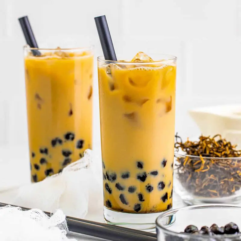 two glasses of caramel bubble tea; Photo credit: Tornadough Alli; Name of the photographer: unknown