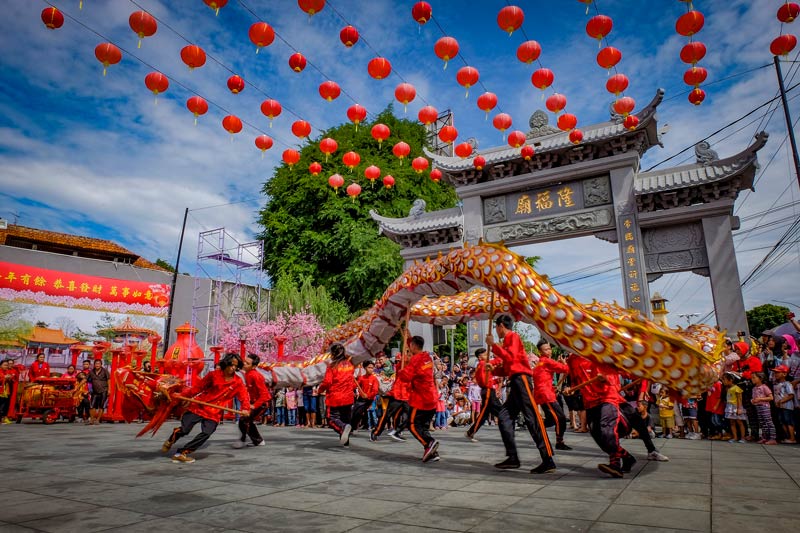 Dragon dance in the celebration of Chinese New Year; Photo source: Wikimedia; Photographer: Heri nugroho
