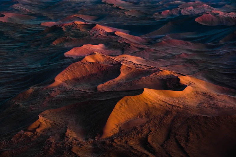 The smooth curve of the Namib hills from above