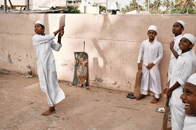 Arab teenagers playing in the street
