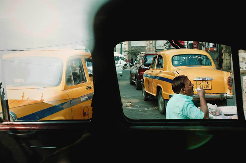 Yellow taxis on Asian streets
