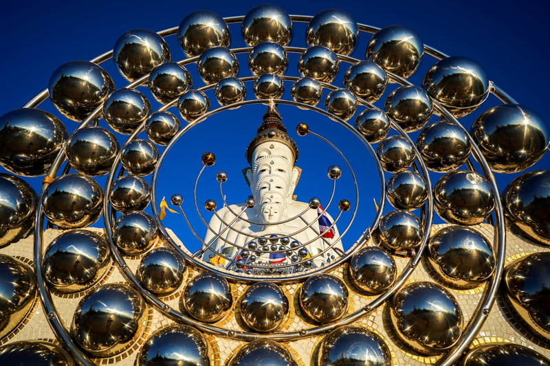 Large Buddha statues in a temple in <a href=