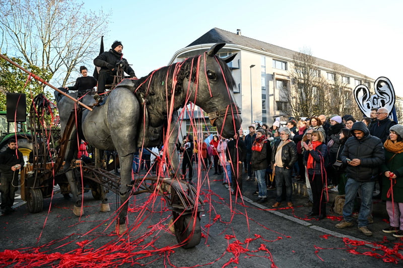 Members of the Paris Benares theater group during a demonstration in western <a href=