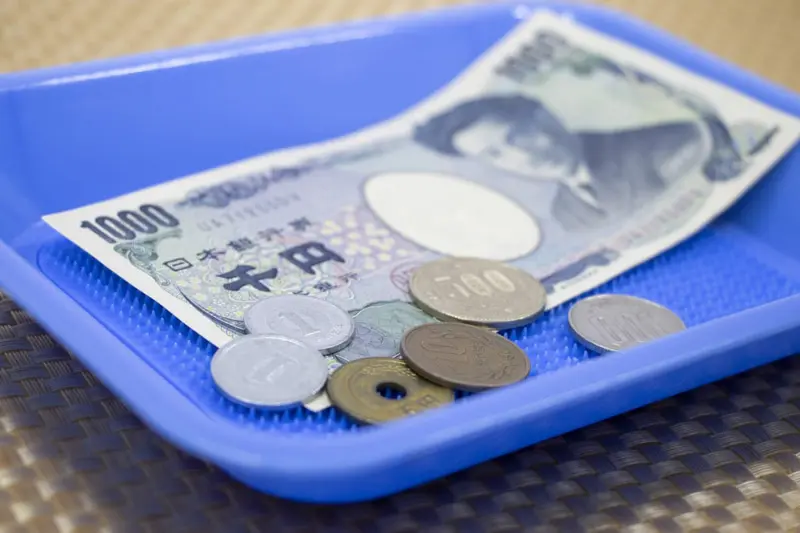 In-tray payme in Japan; Photo source: jw-webmagazine.com; Photographer: Unknown