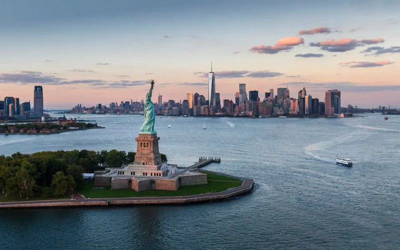 Statue of Liberty with New York background; Photo Source: Forbes, Photographer: Unknown