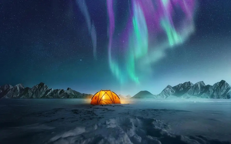 camping under the aurora borealis; Photo Source: Forbes, Photographer: Unknown