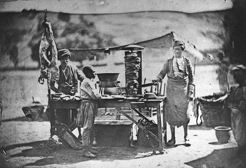 Historical photo of doner kebab in 1855; Photo source: Wikimedia; Photographer: James Robertson