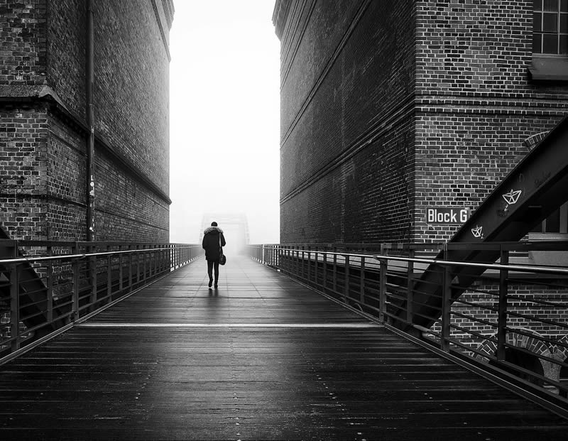 Walking along the tall buildings of Hamburg