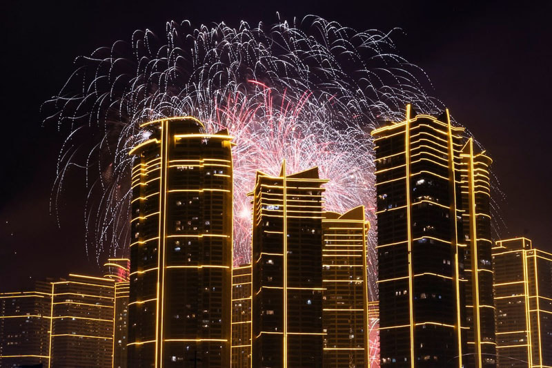 Fireworks over Rockwell Ceer during the New Year celebration in Mandaluyong City, Metro Manila, Philippines; Photo source: REUTERS; Photographer's name: Eloisa Lopez
