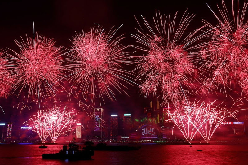 Fireworks over Victoria Harbor to celebrate the New Year in <a href=